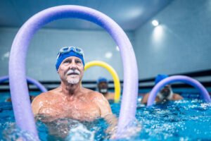Swimming and water aerobics for joint-friendly workouts for men over 60
