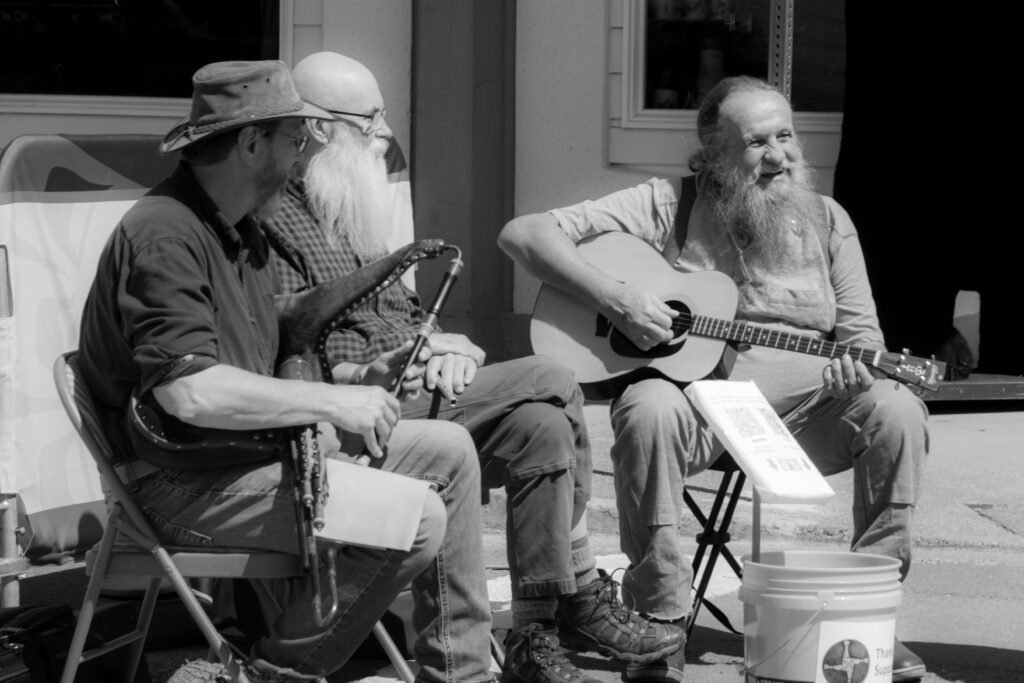 Older Men Playing Guitar