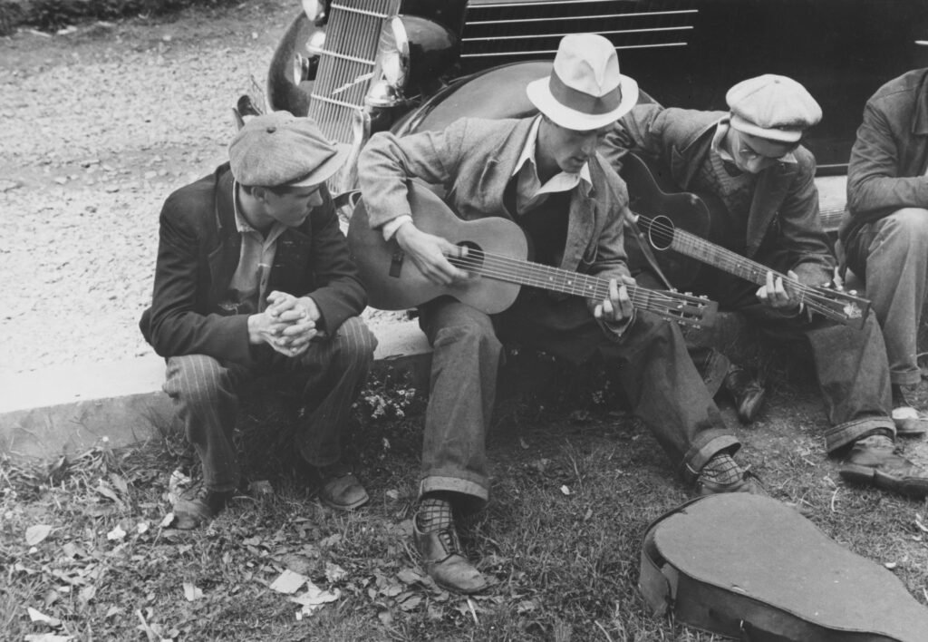 Older Men Playing Guitar